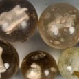 [from Marbles Galore] Sulphides, or figure marbles, are large translucent marbles manufactured in Germany from the mid-19th century up until the 1930s. Usually 1 1/2″ or […]